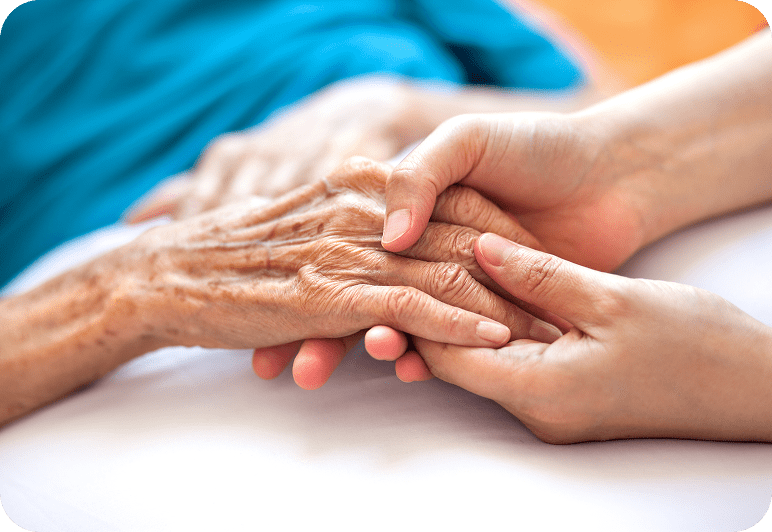 Holding elderly person's hand with care.